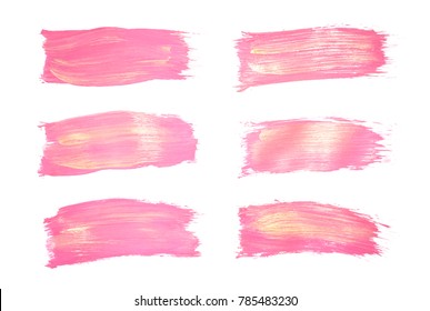 Vector pink and gold paint smear stroke stain set. Abstract gold glittering textured art illustration. Gold Texture Paint Stain Illustration. Hand drawn brush strokes vector elements. Acrilyc strokes.