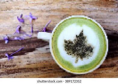 vector pixel , cup of matcha green tea latte art with leaf style  on wooden texture