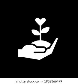 vector plant of love, held by hand, on black background.