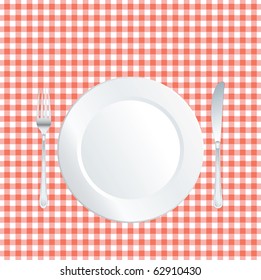 vector plate on red square tablecloth