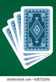 Vector playing cards back sides on green background