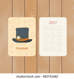 Vector pocket calendar for 2017 with steampunk style top hat with copper watch and gears in doodle style