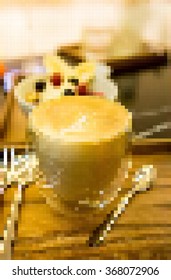 vector polygon , hot cappuccino coffee on wooden table