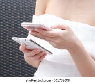 vector polygon ,  woman hand on beautiful dress use two smart phone 