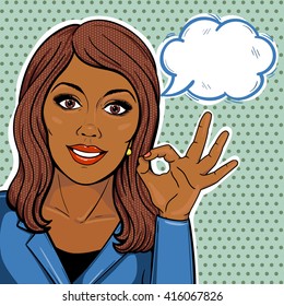 Vector pop art comic african american businesswoman showing ok hand sign with thought balloon.