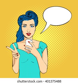 Vector pop art woman face with open mouth holding a phone in her hands. Victory gesture. Retro style.