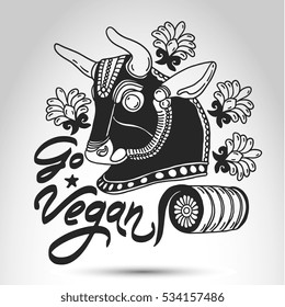 Vector poster "Go Vegan" with bull head doodle and abstract floral elements