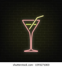 Vector poster of neon light cocktail glass ware on grunge brick wall background. Bright cocktail with straw in retro style. Glowing banner for cards, posters, templates and your own projects. EPS 10.