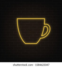 Vector poster of neon light coffee cup on grunge brick wall background. Bright yellow cup silhouette in retro style. Glowing banner for your own projects. EPS 10 file.