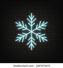 Vector poster of neon light snowflake on grunge brick wall background. Bright snowflake symbol in retro style. Glowing winter banner for cards, posters, templates and your own projects. EPS 10 file.