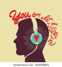 Vector poster "You are what you listen to" with human head silhouette and headphones isolated on abstract background