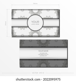 Vector Preparation of business cards in white with black patterns. Template for print design business card with monogram ornament.