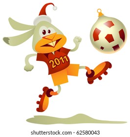 Vector rabbit, the symbol of  2011, kicking the bauble-shaped football