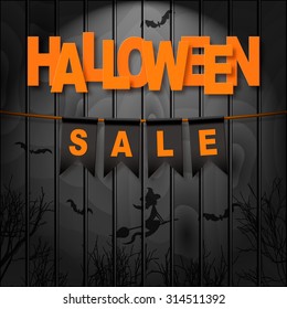 Vector realistic banner with black party flags on dark wooden background. HALLOWEEN SALE. Easy to edit.