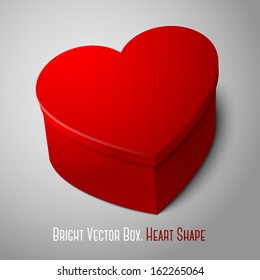 Vector realistic blank big bright red heart shape box isolated on gray background. For your valentines day, wedding or love presents design. 