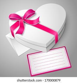 Vector realistic blank white heart shape box with ribbon and bow-knot isolated on gray background with envelope and message card for your text. For your valentines day or love presents design.