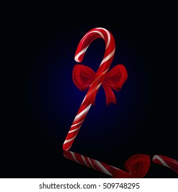 Vector Realistic Candy Cane with red bow on a black background. Vector illustration. New Year's design element. Merry Christmas greeting card.
