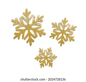 Vector realistic golden snowflakes with glittering texture. Winter holiday traditional decoration.