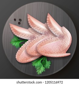 Vector realistic illustration of three raw chicken wings with peppercorns and parsley close up on wooden black cutting board isolated on black background, top view