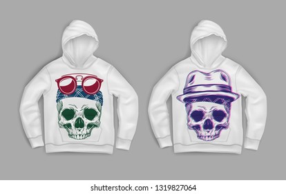 Vector realistic illustration of two colorful skulls with glasses and a hat printed on hooded white sweater isolated on gray background
