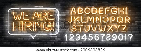 Vector realistic isolated neon sign of We Are Hiring with easy to change color alphabet font logo for template decoration and invitation covering on the wall background.