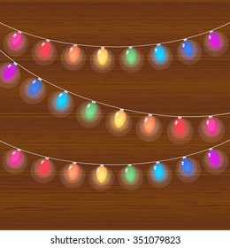 vector realistic lantern garland on wood background