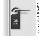 Vector realistic paper black blank door hanger on white realistic wooden door with metal silver handle. Door hanger mockup. Design template. Full length door is in a clipping mask