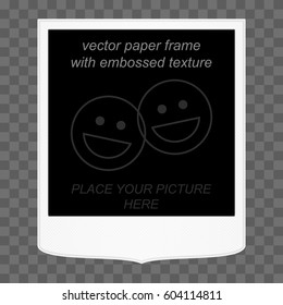Vector realistic retro photo frame with an embossed paper surface and a thin grey border. The black square contains two draft emoticons and explonatory text 'place your picture here'. Original shape.
