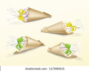 Vector realistic set of paper cone bags with colorful candies dragee and yellow and green silk ribbons. Hand made packaging for sweet snacks, gifts and souvenirs twisted from kraft paper