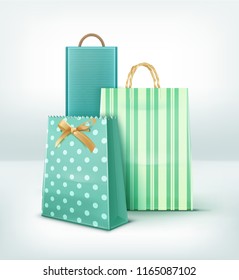 Vector realistic set of paper gift bags and shopping bags different forms and patterns isolated on background