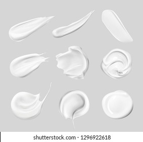 Vector realistic set of smears of cosmetic white cream for skin of different shapes and sizes isolated on background, top view - Shutterstock ID 1296922618