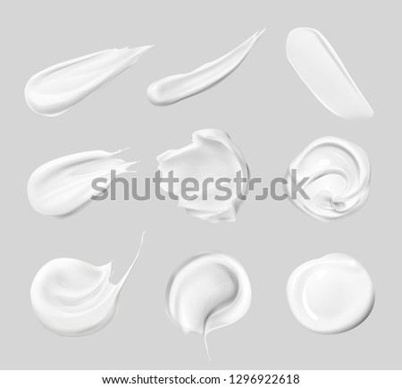 Vector realistic set of smears of cosmetic white cream for skin of different shapes and sizes isolated on background, top view