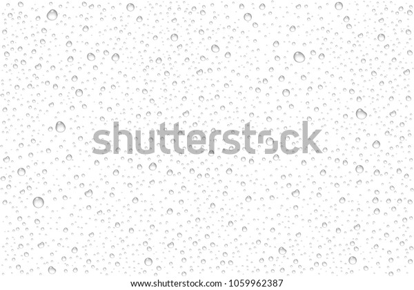 Vector realistic\
water drops condensed on transparent background. Rain droplets\
without shadows for transparent surface. Pure water bubbles\
isolated. Many forms and\
sizes.