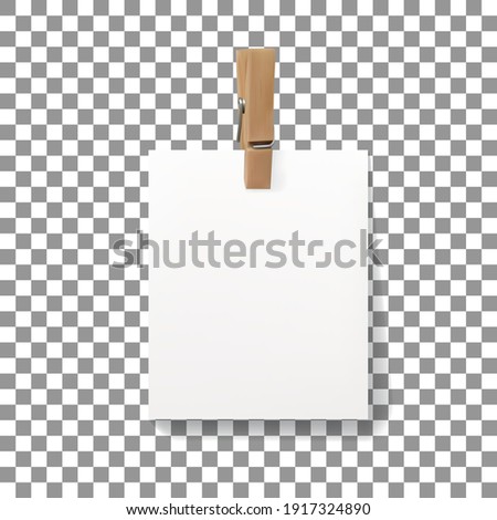 Vector realistic wooden clothespin peg with hanged piece of paper sheet. Illustration with copy space isolated on on checkered background.
