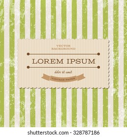 Vector rectangular vintage cardboard label over green striped weathered background. Old paper grungy texture. Retro style.