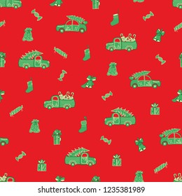Vector red Christmas seamless pattern background with bells, stockings, gift boxes, and green trucks loaded with trees, candies and candy canes. Perfect for winter holidays gift wrapping, fabric.