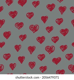 Vector red doodle hearts on a grey background seamless pattern. Hand drawn, fun and lighthearted design. Perfect for fabric, wallpaper, scrapbooking and stationery.