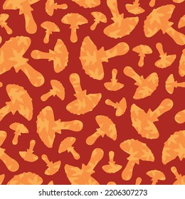 Hongos rojos vectoriales con hojas anaranjadas sin costura. Perfecto para la tela, los muros, los proyectos.