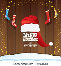 vector red Santa hat  with christmas socks and greeting text Merry Christmas and Happy new year on wooden background. vector merry christmas greeting card, banner design template or xmas background. 