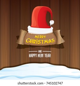 vector red Santa hat  with paper banner and greeting text Merry Christmas and Happy new year on wooden background. vector merry christmas card, banner design template or xmas background. 