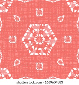 Vector red shibori monochrome hexagon seamless pattern with canvas background. Suitable for textile, gift wrap and wallpaper.