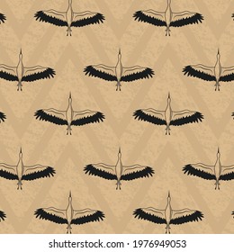Vector Repeat Pattern With Textured Brown Bankground and Flying Storks Silhouettes. Great for Wallpaper, Fabric, Packaging Sketchbook Cover and more.