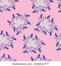 A vector repeat seamless pattern design featuring bouquets of white daisies and navy blue lupines on a pink background.