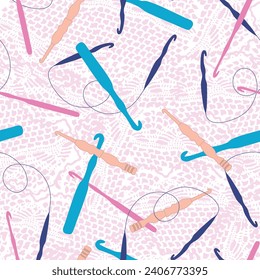 A vector repeat seamless pattern design created with a pink doily texture background with a variety of scattered crochet hooks in teal, pink, navy, blue, and orange.