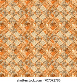 Vector repeated oriental motif for fabric or paper design. Seamless ethnic patterns for border in yellow, orange and beige colors.