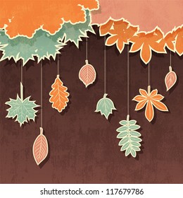 Vector retro background with appliques of autumn leaves