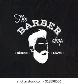 Vector retro barber shop logo on the blackboard for your design