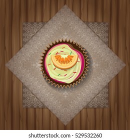 Vector retro cupcake on lacy napkin and a wooden table