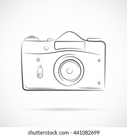 Vector Retro DSLR camera in thin line design isolated on white background. Photocamera vector outline icon. Element for your retro photo and cinema projects.