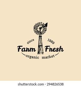 Vector retro farm fresh logotype. Organic premium quality products badge. Eco food sign. Vintage hand sketched windmill icon.